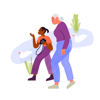 Illustration of two women walking in a park having a friendly conversation, one of the women is holding a camera. In the background there is a pond with ducks in it.